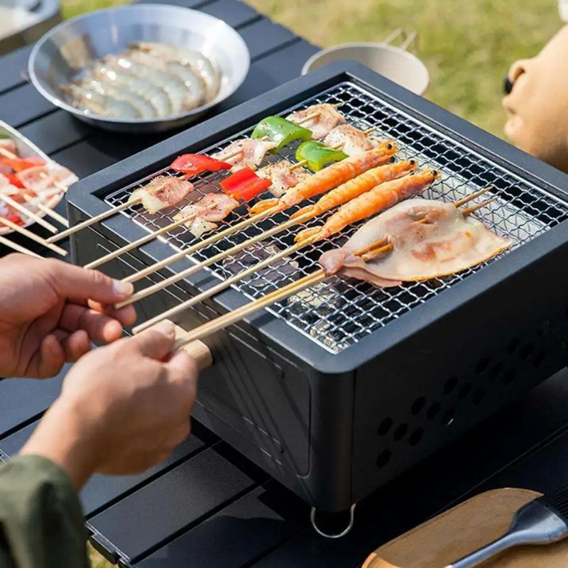 เตาปิ้งย่างถ่านแบบพกพาสำหรับตั - Camping Cooking Grill บทวิจารณ์และราคา